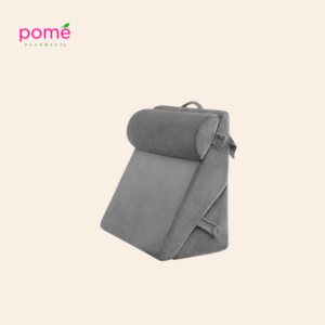 Supportive wedge pillow designed to elevate the upper body or legs for added comfort during recovery.
